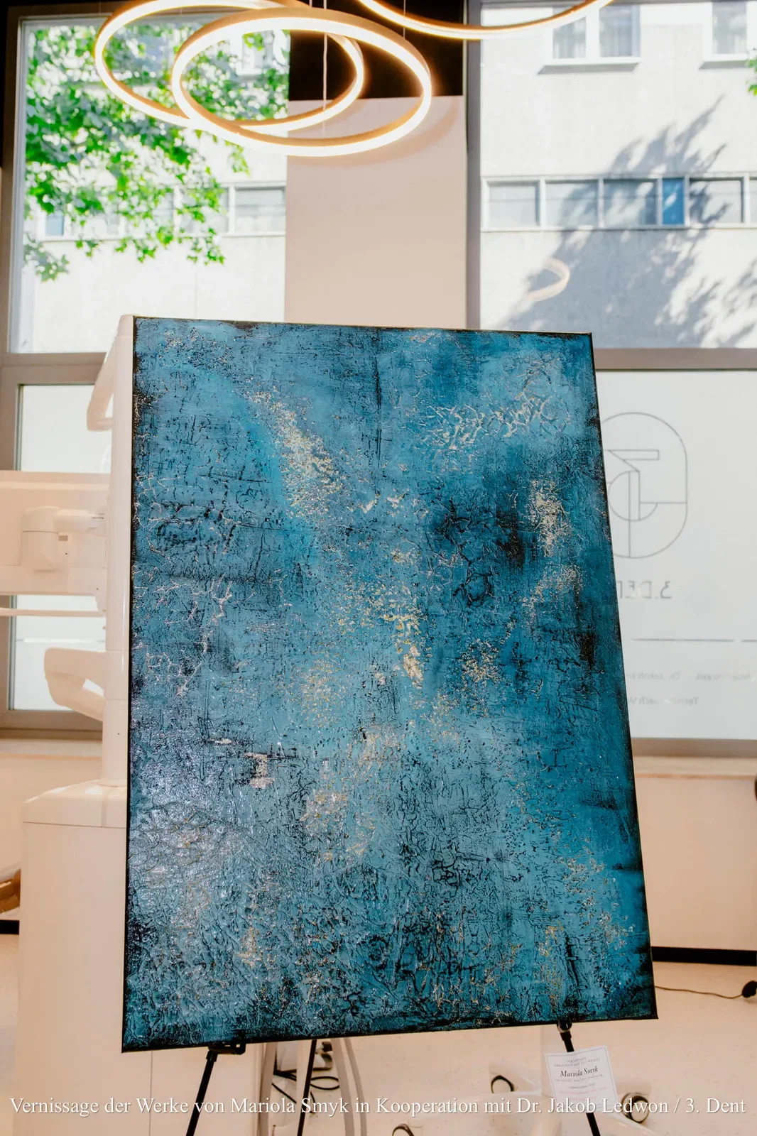 Assortment of Acrylic Art, Pouring Artwork, Textile Design Products, Apaszki Scarves, and Pareo in Gallery Showcase