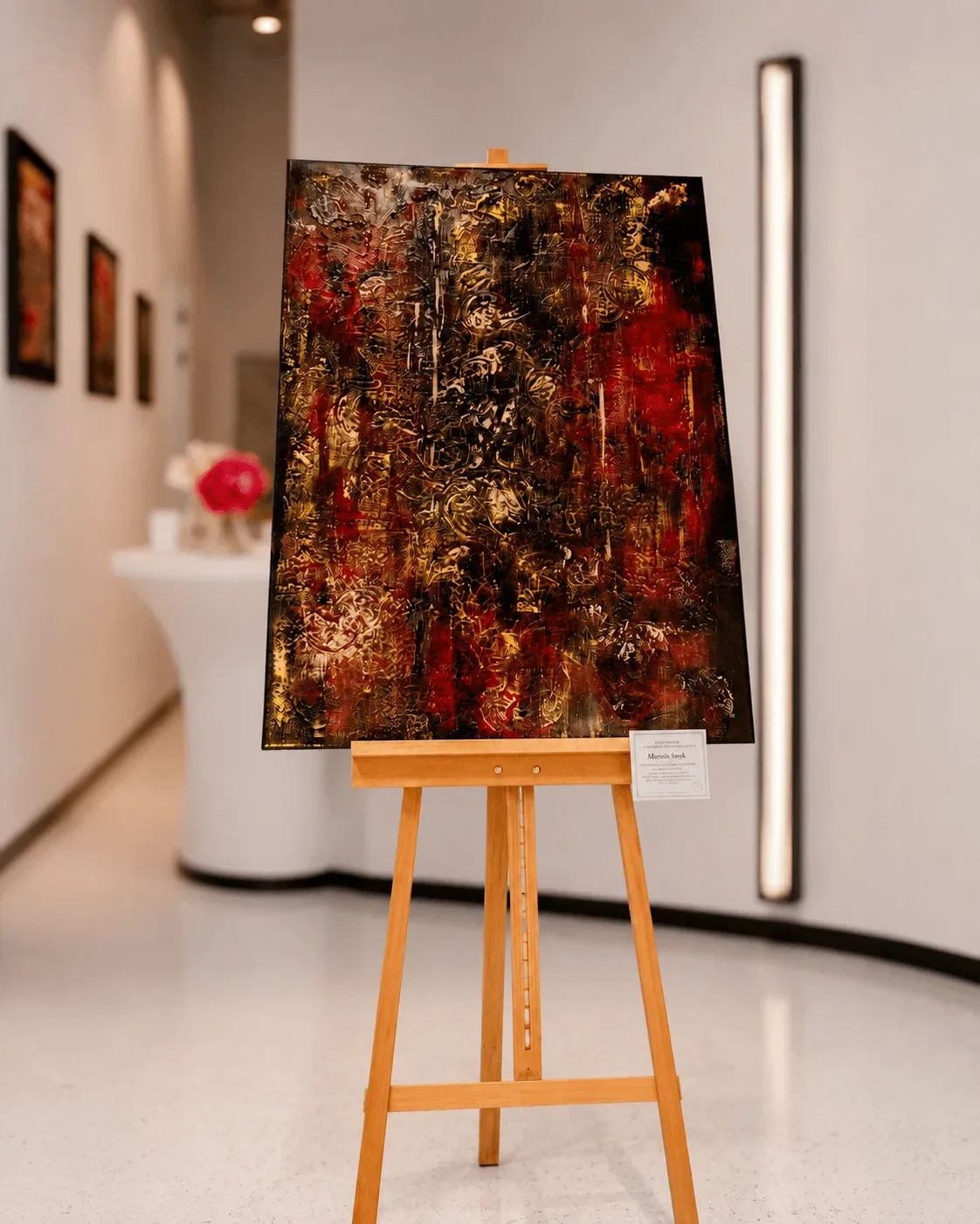 Assortment of Acrylic Art, Pouring Artwork, Textile Design Products, Apaszki Scarves, and Pareo in Gallery Showcase